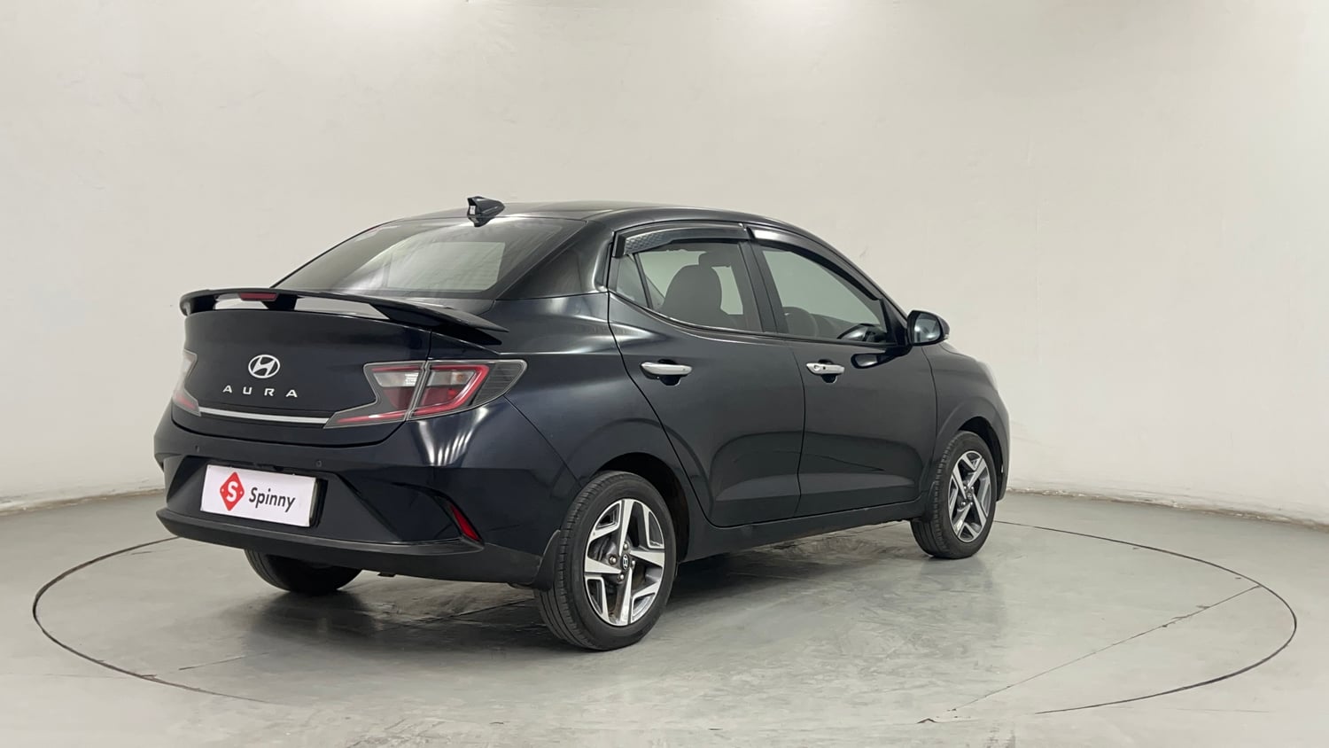 Used 2024 Hyundai Aura SX 1.2 CNG Cng Manual exterior RIGHT REAR CORNER VIEW
