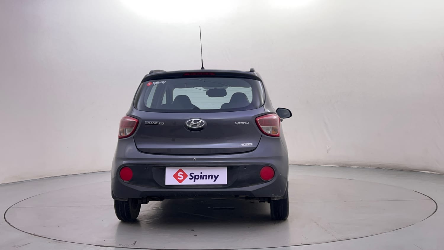 Used 2017 Hyundai Grand i10 Sportz (O) AT 1.2 Kappa VTVT Petrol Automatic exterior BACK VIEW