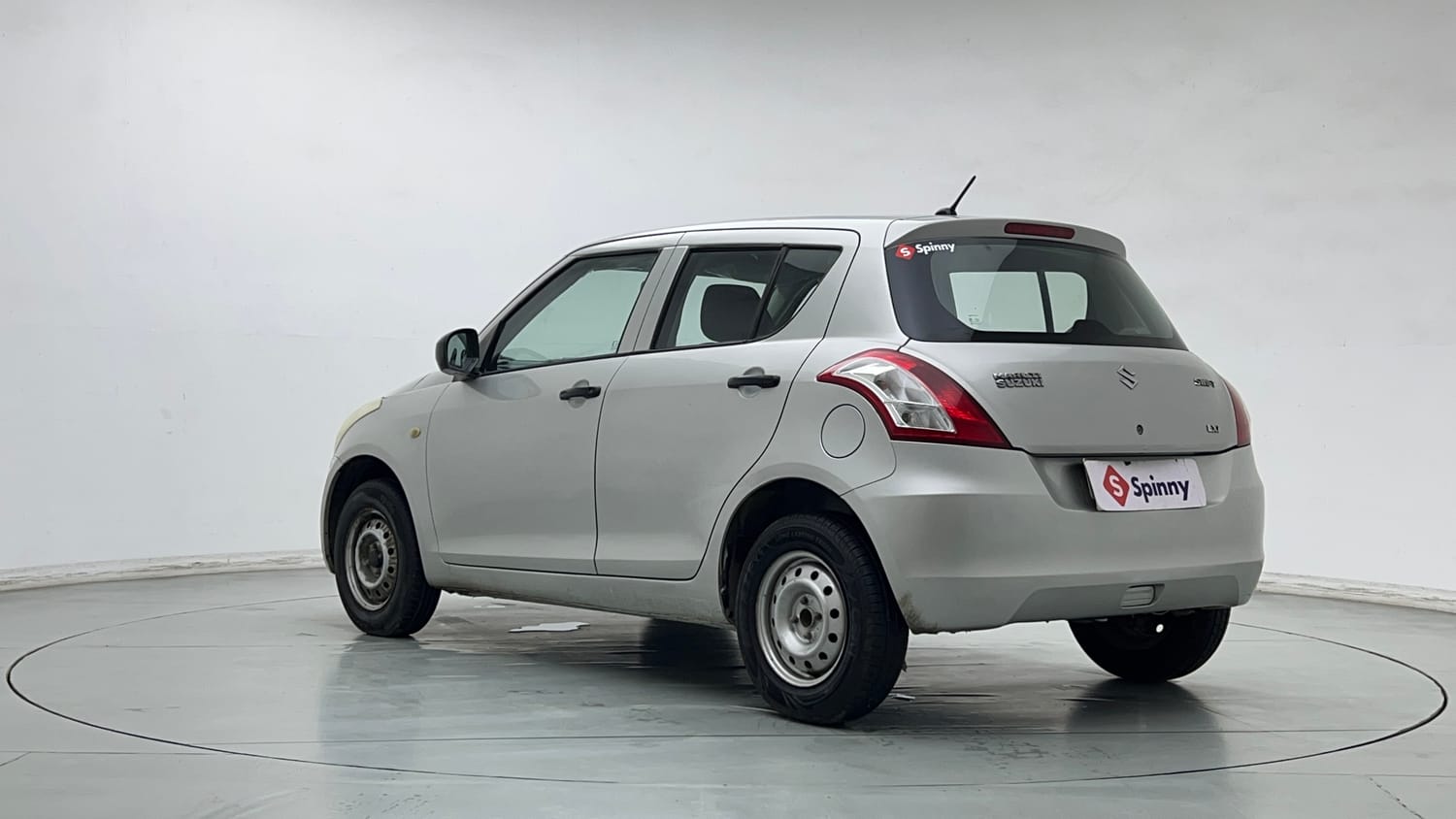 Used 2013 Maruti Suzuki Swift LXi Petrol Manual exterior LEFT REAR CORNER VIEW