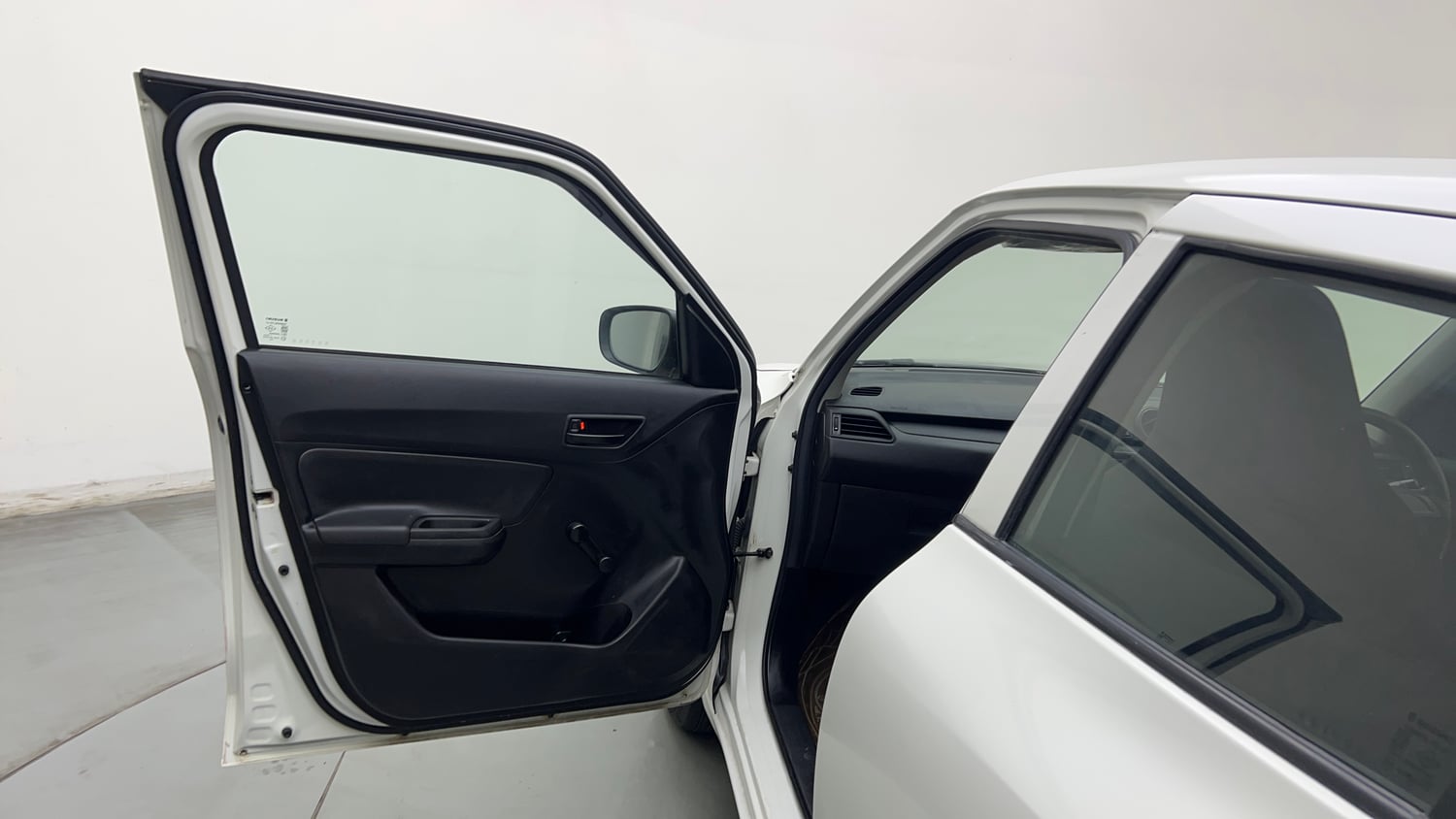 Used 2023 Maruti Suzuki Swift LXi Petrol Manual interior LEFT FRONT DOOR OPEN VIEW
