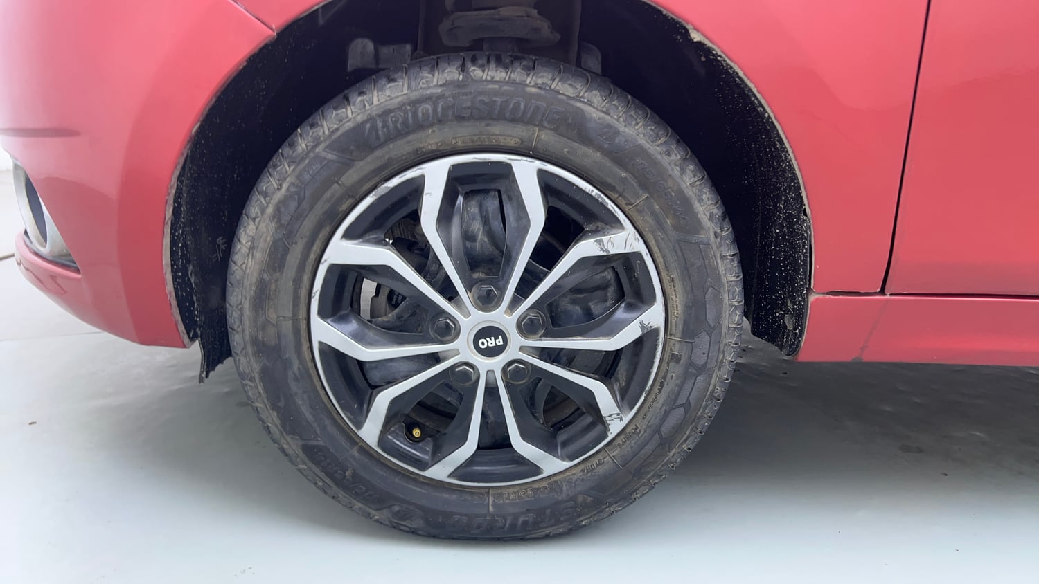 Used 2019 Tata Tiago Revotron XZ w/o Alloy Petrol Manual tyres LEFT FRONT TYRE RIM VIEW