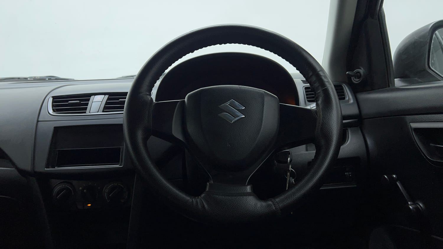Used 2013 Maruti Suzuki Swift LXi Petrol Manual interior STEERING VIEW