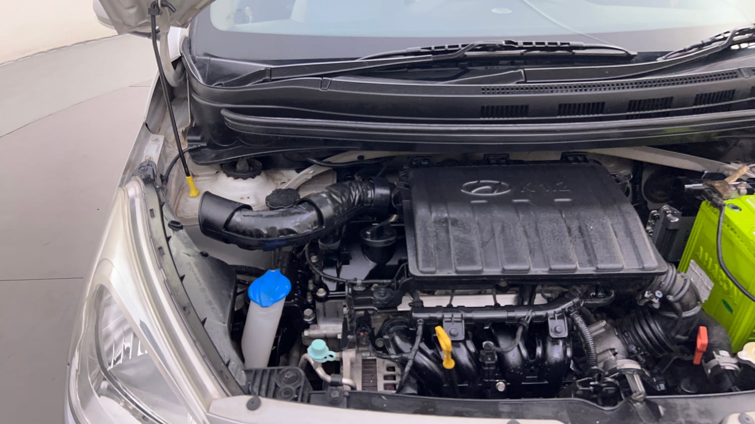 Used 2018 Hyundai Grand i10 Sportz AT 1.2 Kappa VTVT Petrol Automatic engine ENGINE RIGHT SIDE HINGE & APRON VIEW