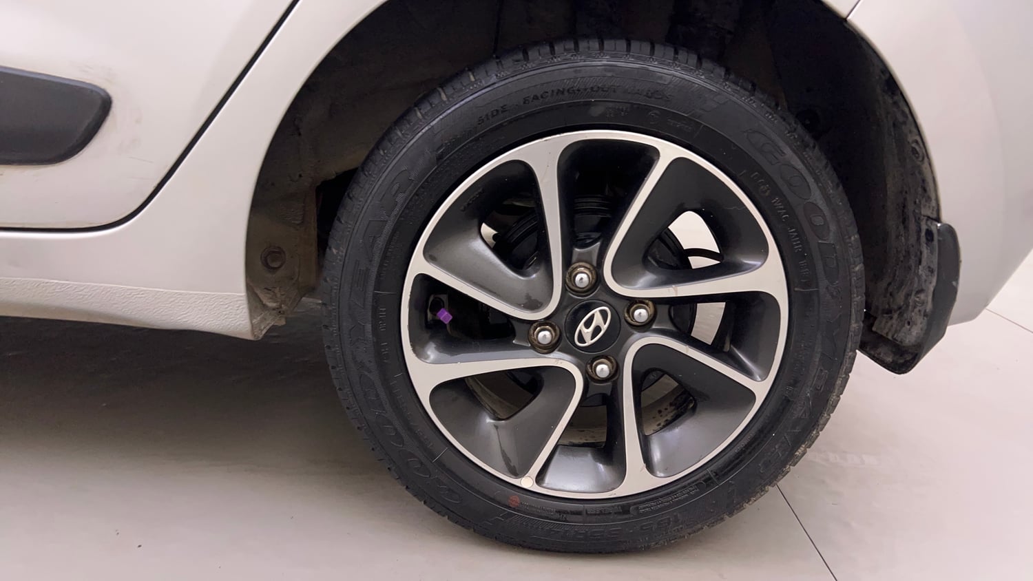 Used 2018 Hyundai Grand i10 Sportz AT 1.2 Kappa VTVT Petrol Automatic tyres LEFT REAR TYRE RIM VIEW