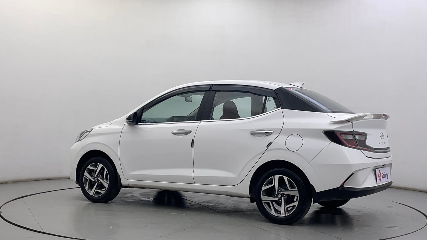 Used 2024 Hyundai Aura SX 1.2 (O) Petrol Petrol Manual exterior LEFT REAR CORNER VIEW