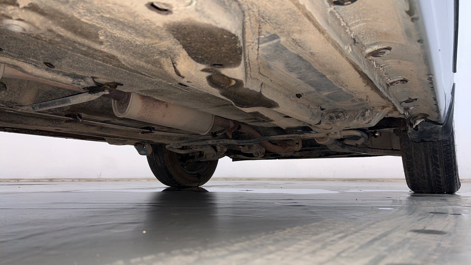 Used 2019 Tata Tiago Revotron XZ w/o Alloy Petrol Manual extra REAR RIGHT UNDERBODY VIEW