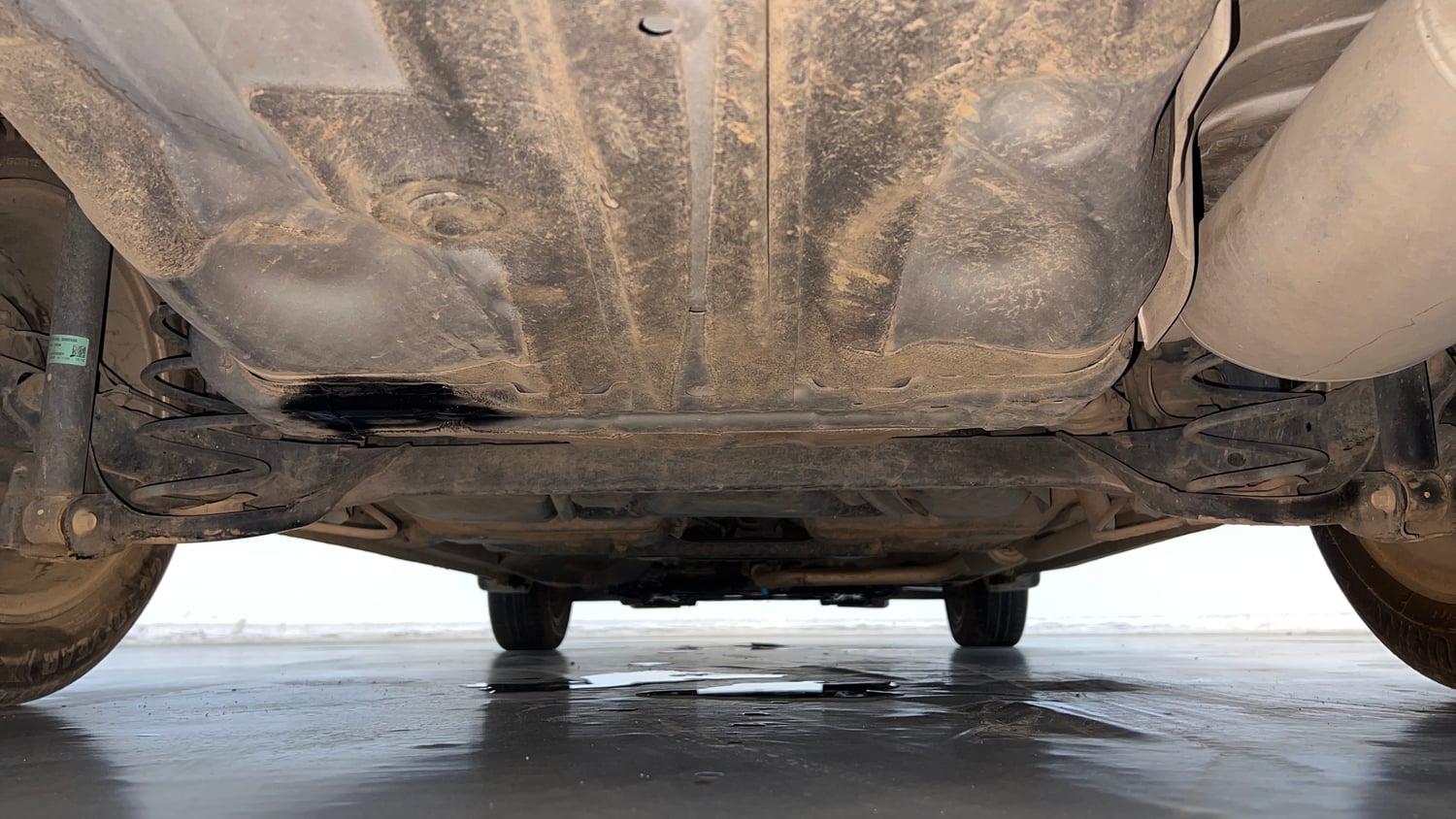 Used 2023 Honda City V Petrol MT Petrol Manual extra REAR UNDERBODY VIEW (TAKEN FROM REAR)