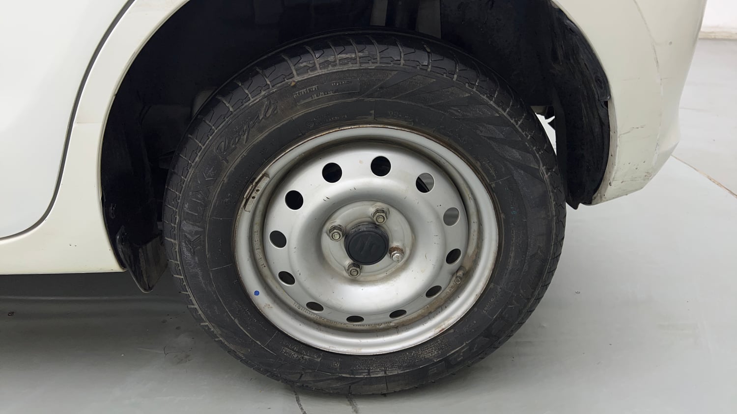 Used 2023 Maruti Suzuki Swift LXi Petrol Manual tyres LEFT REAR TYRE RIM VIEW