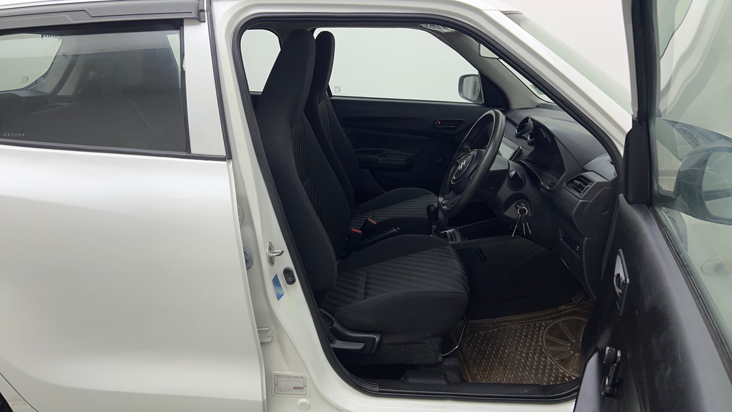 Used 2023 Maruti Suzuki Swift LXi Petrol Manual interior RIGHT SIDE FRONT DOOR CABIN VIEW