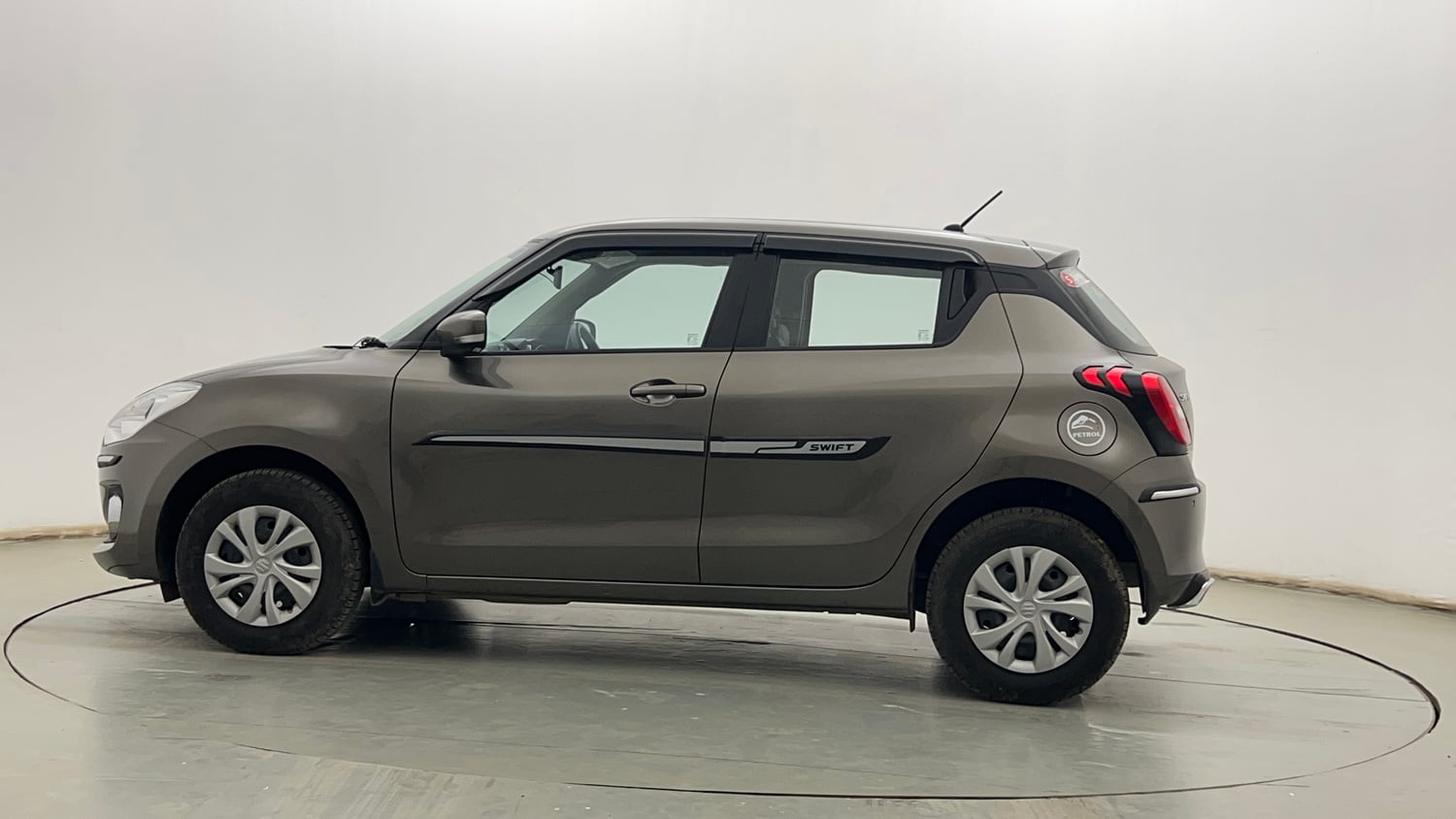 Used 2023 Maruti Suzuki Swift VXi Petrol Manual exterior LEFT SIDE VIEW