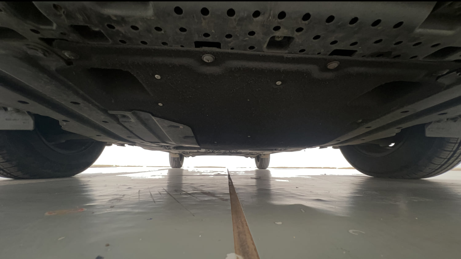 Used 2023 Maruti Suzuki Swift VXi Petrol Manual extra FRONT LEFT UNDERBODY VIEW