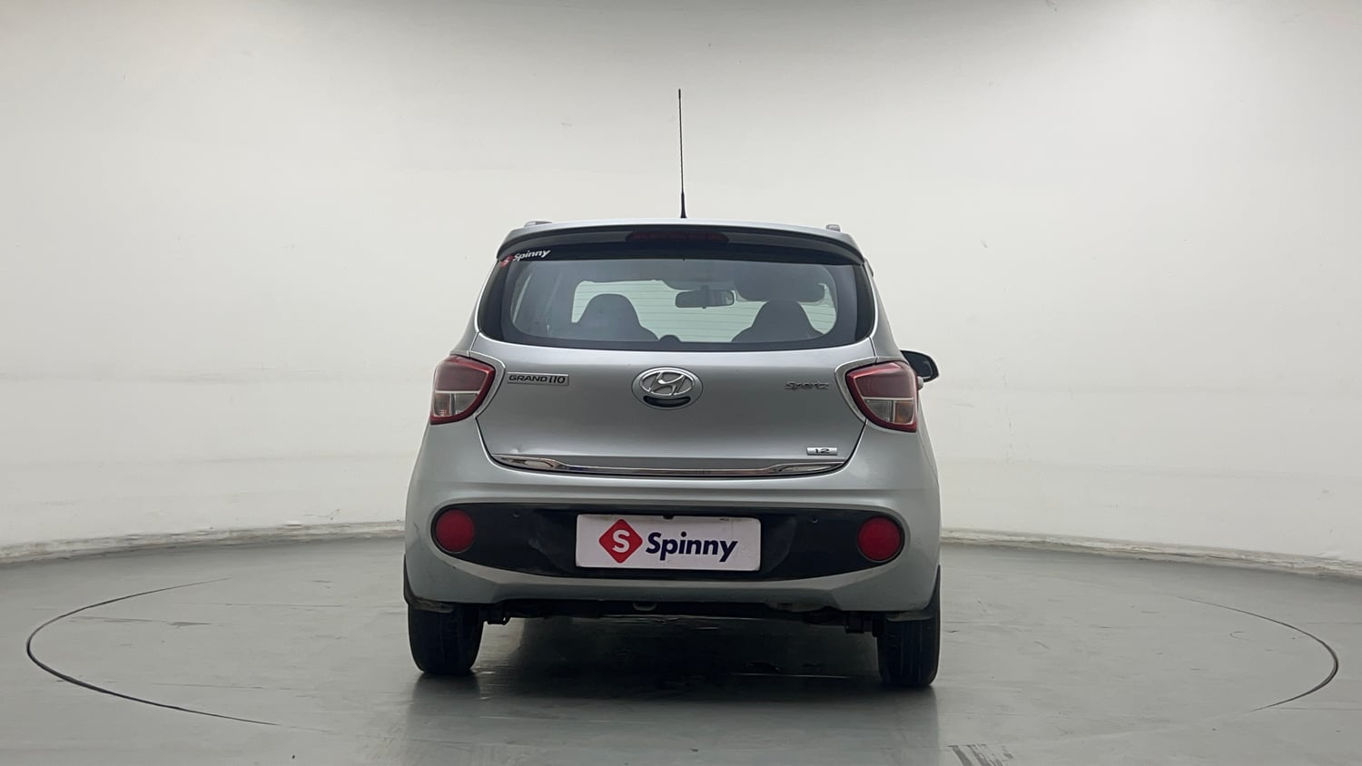 Used 2019 Hyundai Grand i10 Sportz 1.2 Kappa VTVT Petrol Manual exterior BACK VIEW