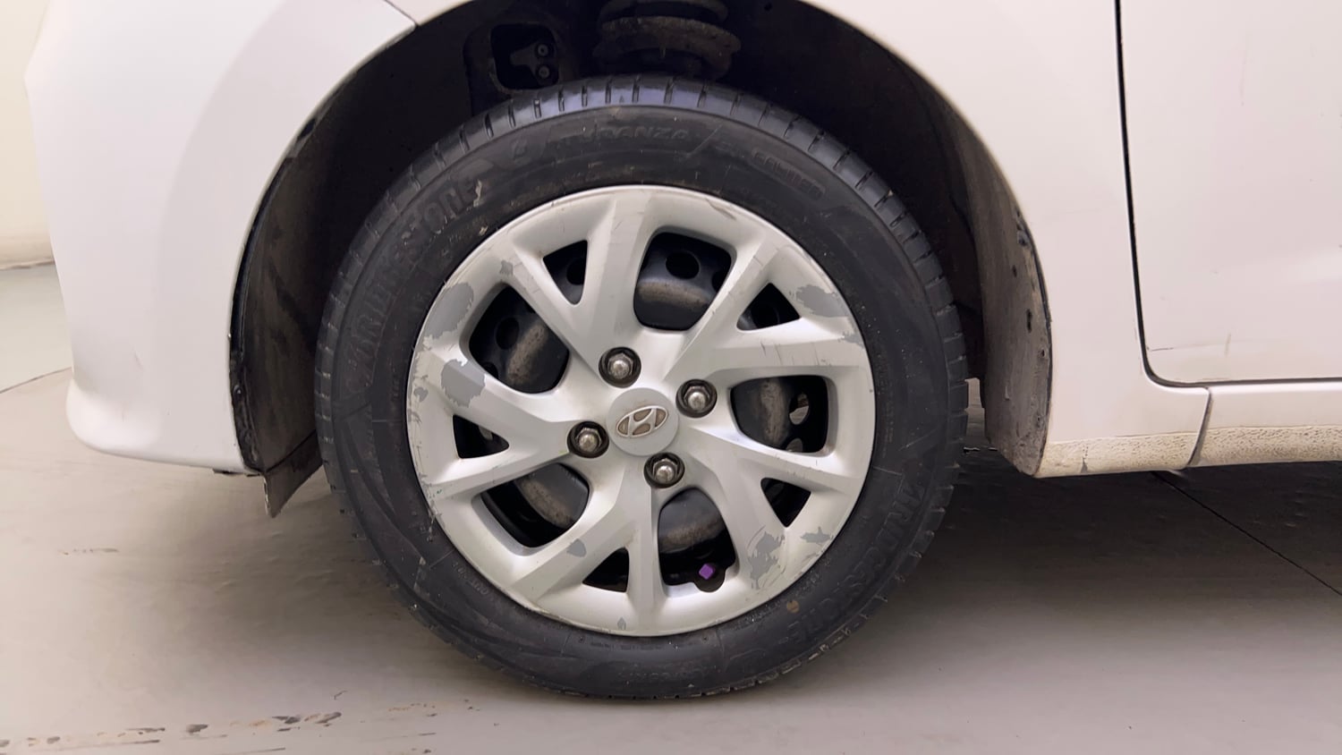 Used 2018 Hyundai Grand i10 Magna 1.2 Kappa VTVT Petrol Manual tyres LEFT FRONT TYRE RIM VIEW