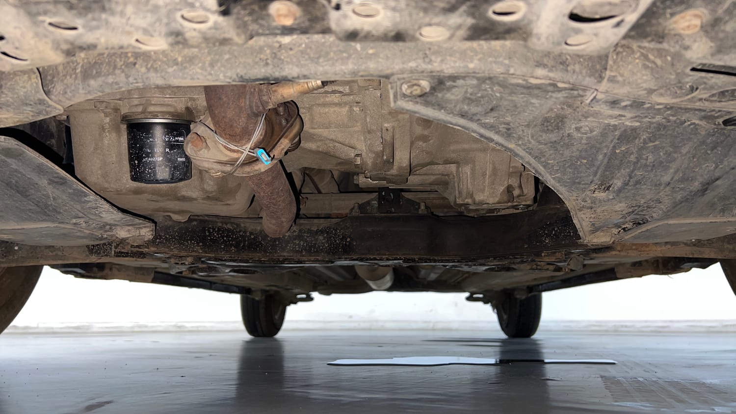 Used 2013 Maruti Suzuki Swift LXi Petrol Manual extra FRONT LEFT UNDERBODY VIEW