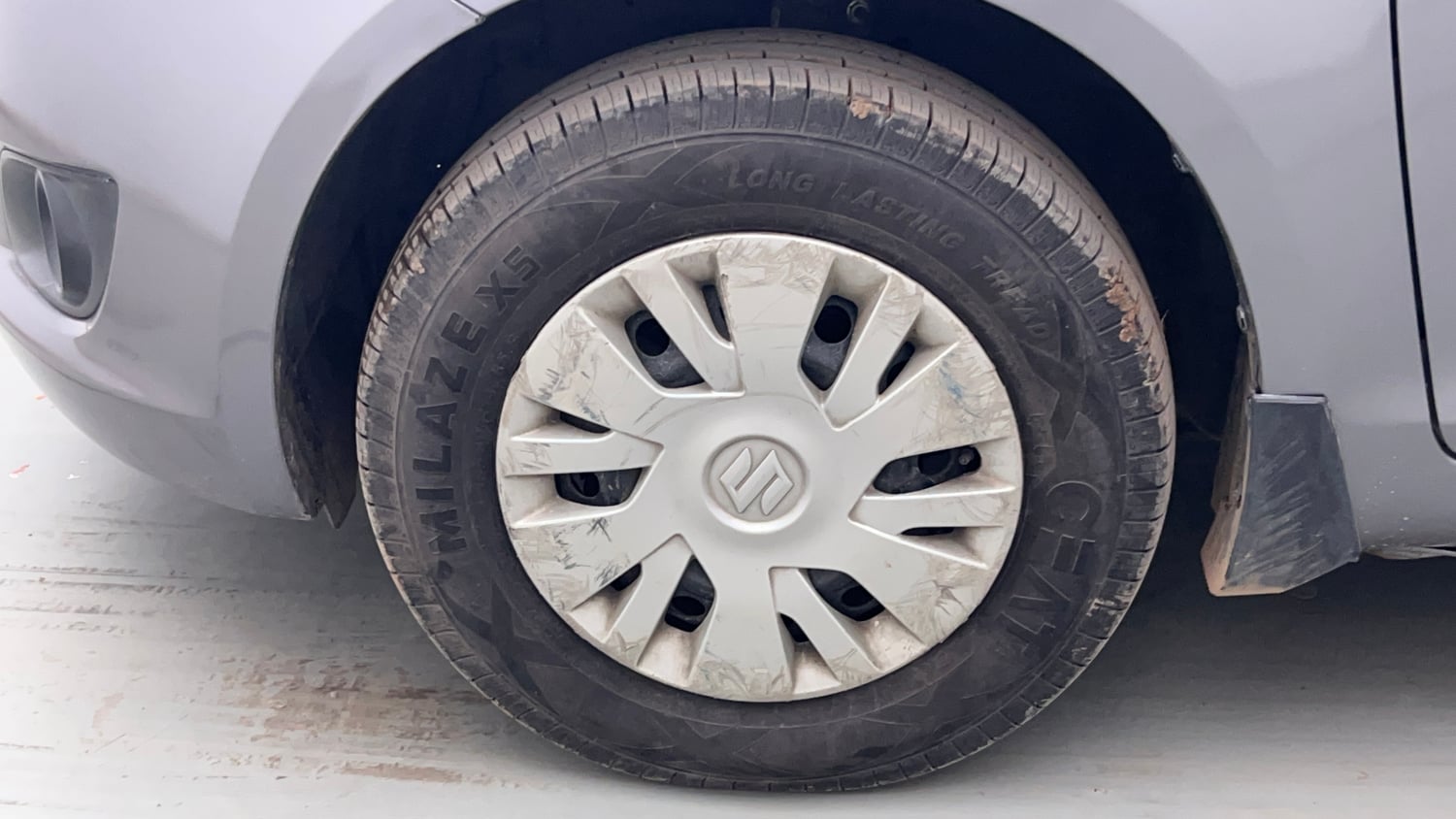Used 2012 Maruti Suzuki Swift VXi Petrol Manual tyres LEFT FRONT TYRE RIM VIEW