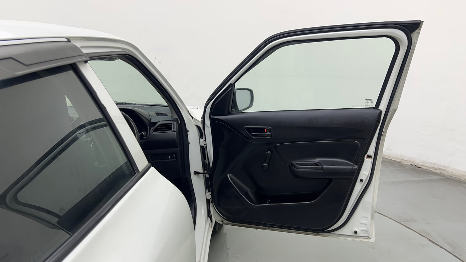 Used 2023 Maruti Suzuki Swift LXi Petrol Manual interior RIGHT FRONT DOOR OPEN VIEW