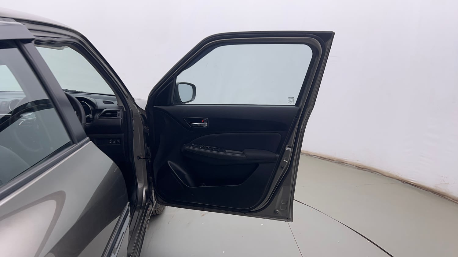 Used 2023 Maruti Suzuki Swift VXi Petrol Manual interior RIGHT FRONT DOOR OPEN VIEW