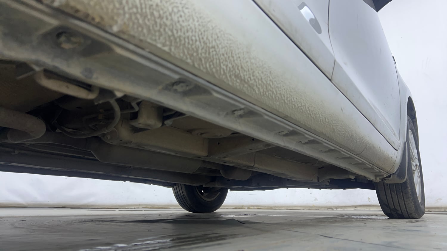 Used 2015 Maruti Suzuki Swift Dzire ZXI Petrol Manual extra REAR RIGHT UNDERBODY VIEW
