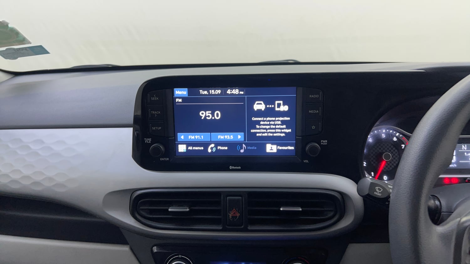 Used 2021 Hyundai Grand i10 Nios Sportz AMT 1.2 Kappa VTVT Petrol Automatic top_features Integrated (in-dash) music system