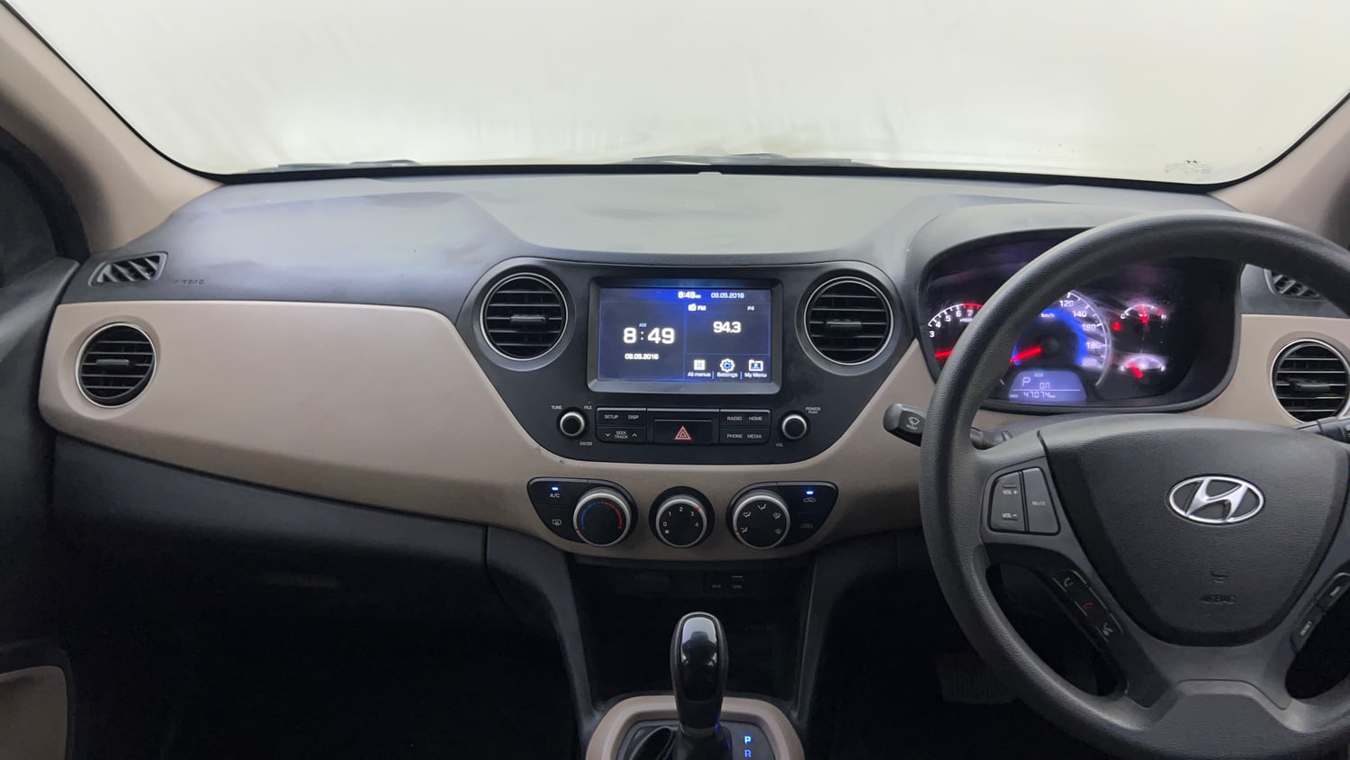Used 2017 Hyundai Grand i10 Sportz (O) AT 1.2 Kappa VTVT Petrol Automatic interior MUSIC SYSTEM & AC CONTROL VIEW