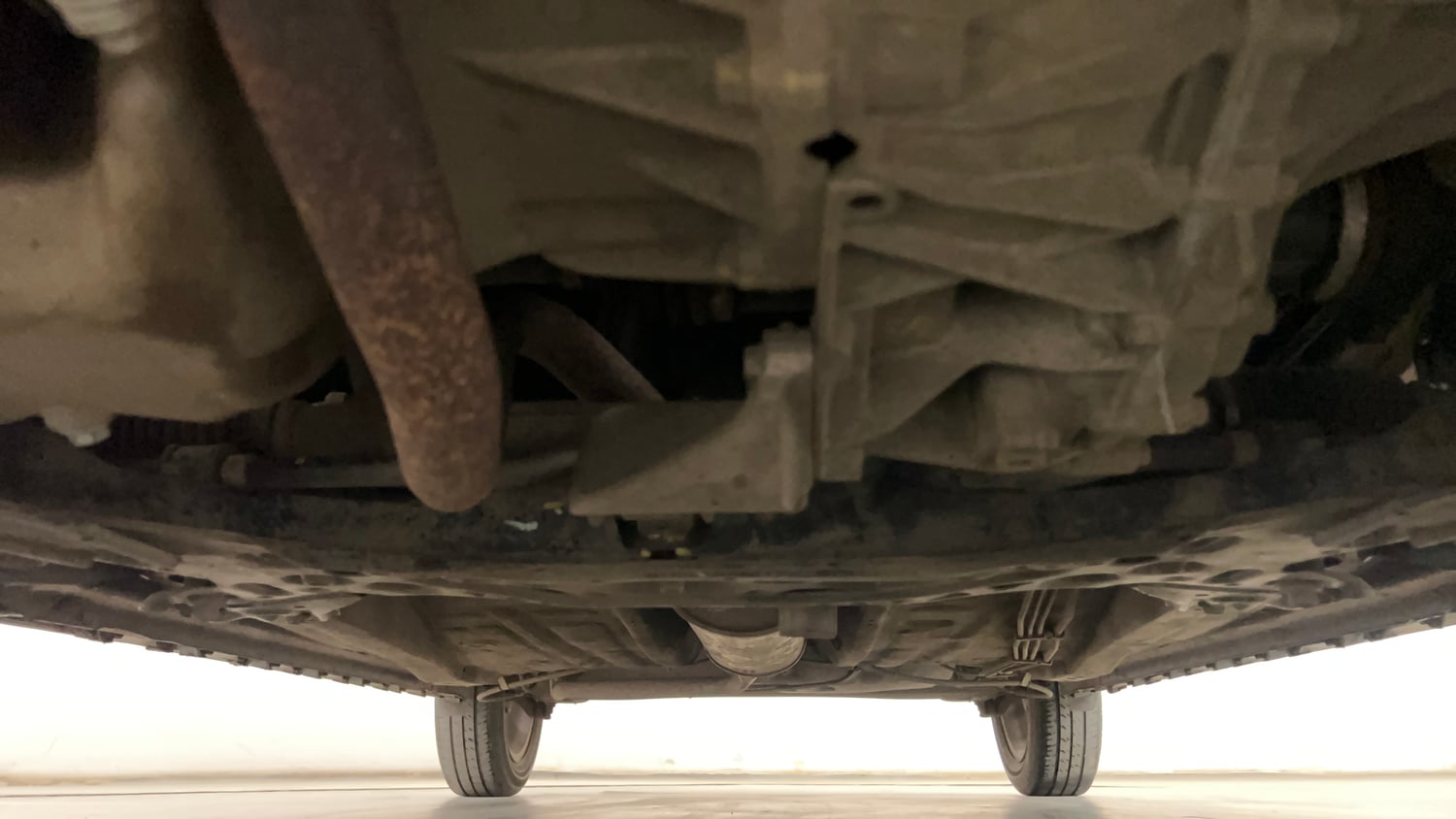 Used 2021 Maruti Suzuki Ignis Zeta 1.2 AMT Petrol Automatic extra FRONT LEFT UNDERBODY VIEW
