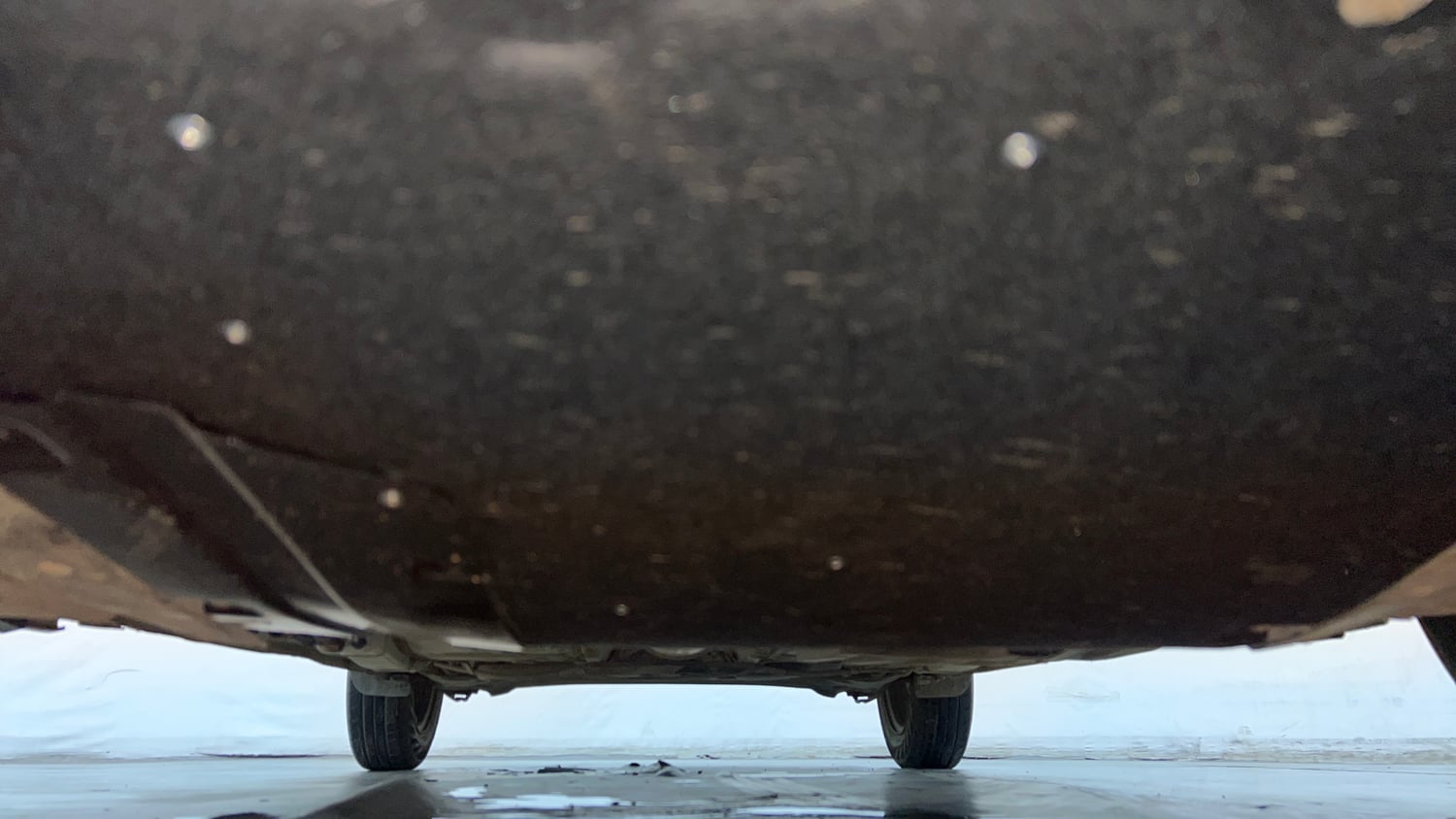 Used 2023 Maruti Suzuki Swift LXi Petrol Manual extra FRONT LEFT UNDERBODY VIEW
