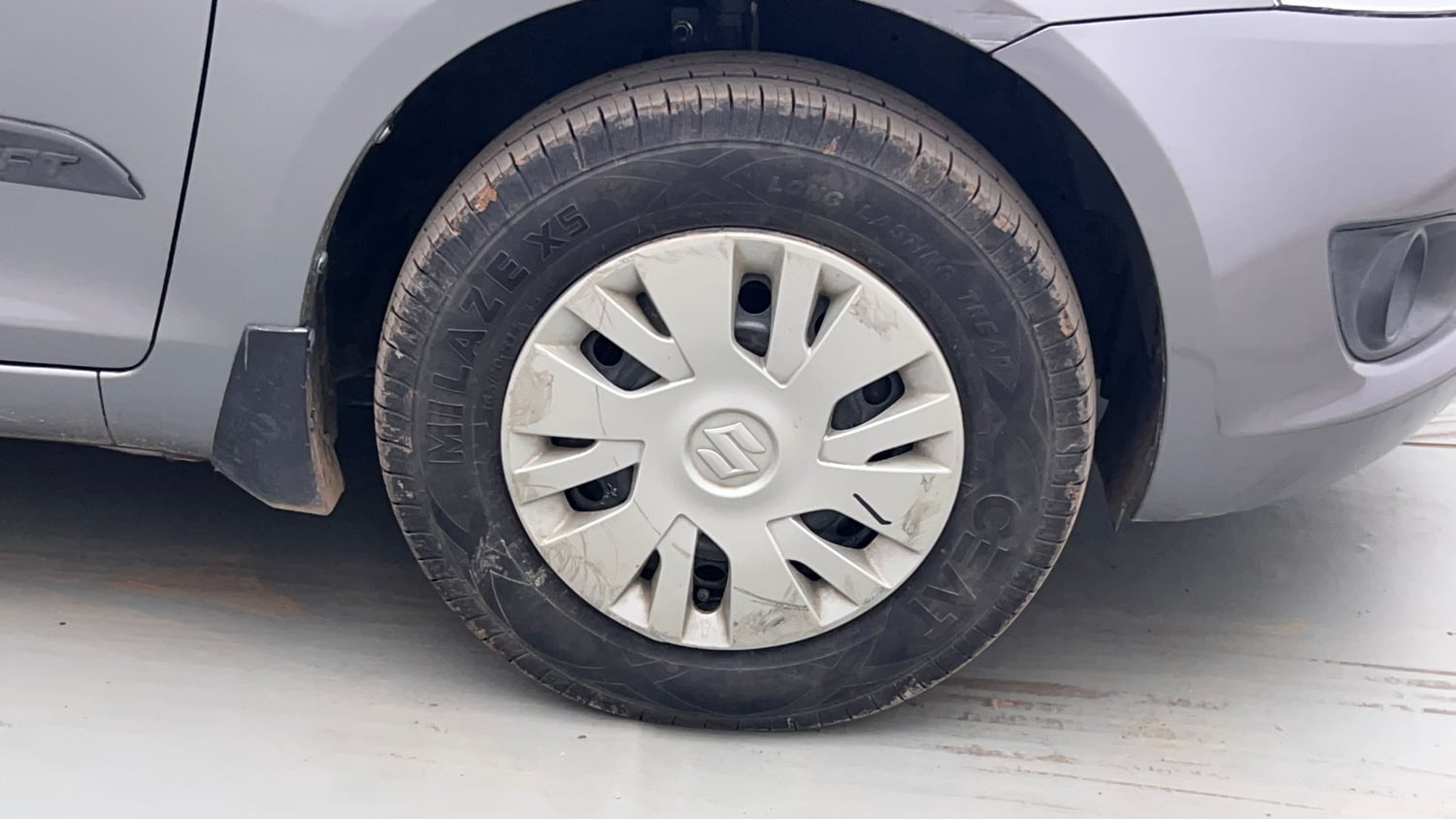 Used 2012 Maruti Suzuki Swift VXi Petrol Manual tyres RIGHT FRONT TYRE RIM VIEW