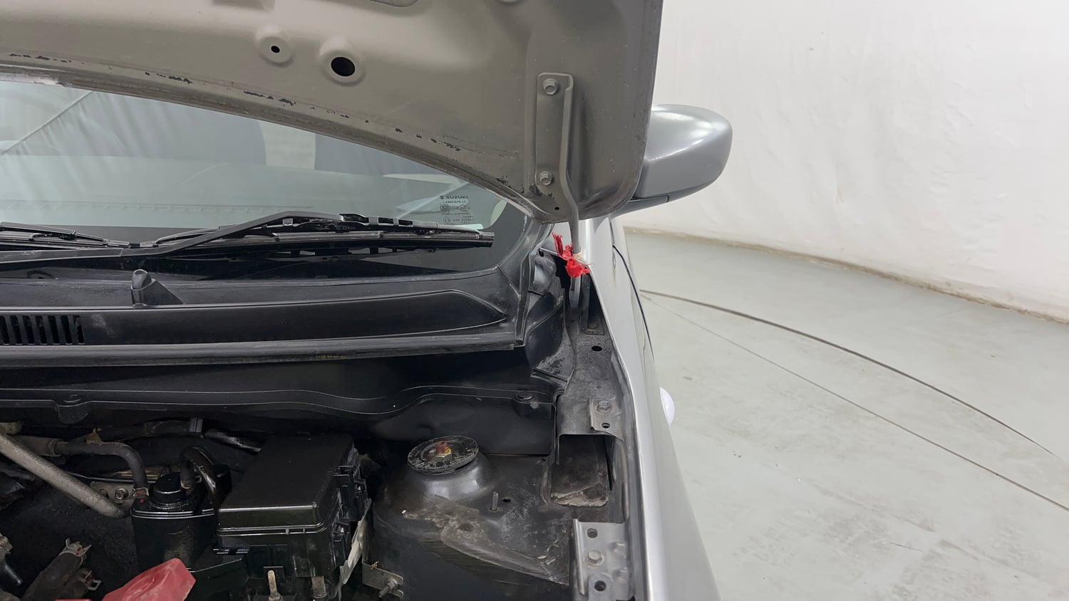 Used 2015 Maruti Suzuki Celerio VXi AMT Petrol Automatic engine ENGINE LEFT SIDE HINGE & APRON VIEW
