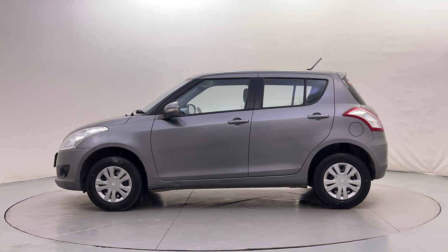 Used 2014 Maruti Suzuki Swift VXi Petrol Manual exterior LEFT SIDE VIEW
