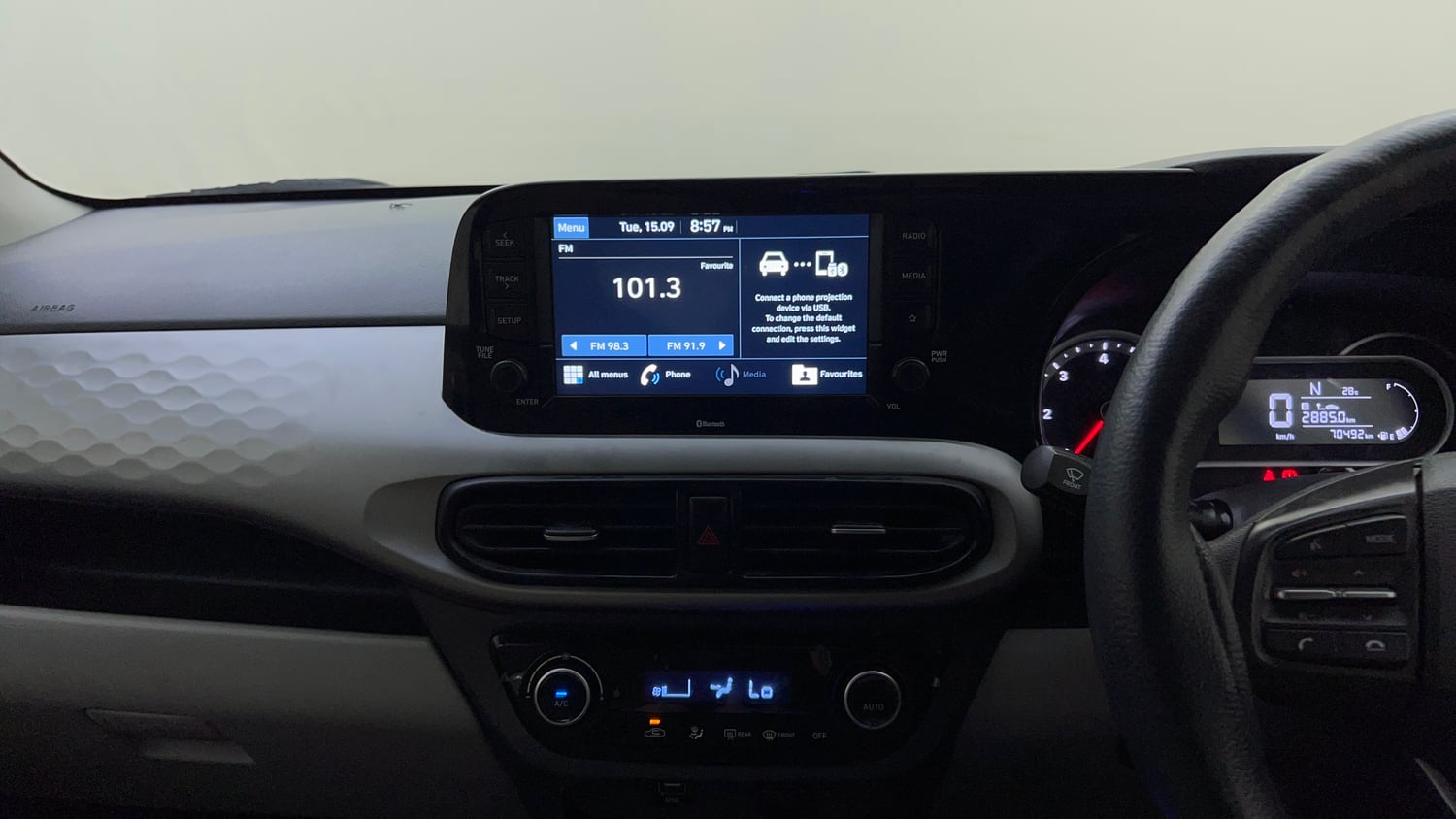 Used 2021 Hyundai Grand i10 Nios Sportz AMT 1.2 CRDi Diesel Automatic top_features Integrated (in-dash) music system