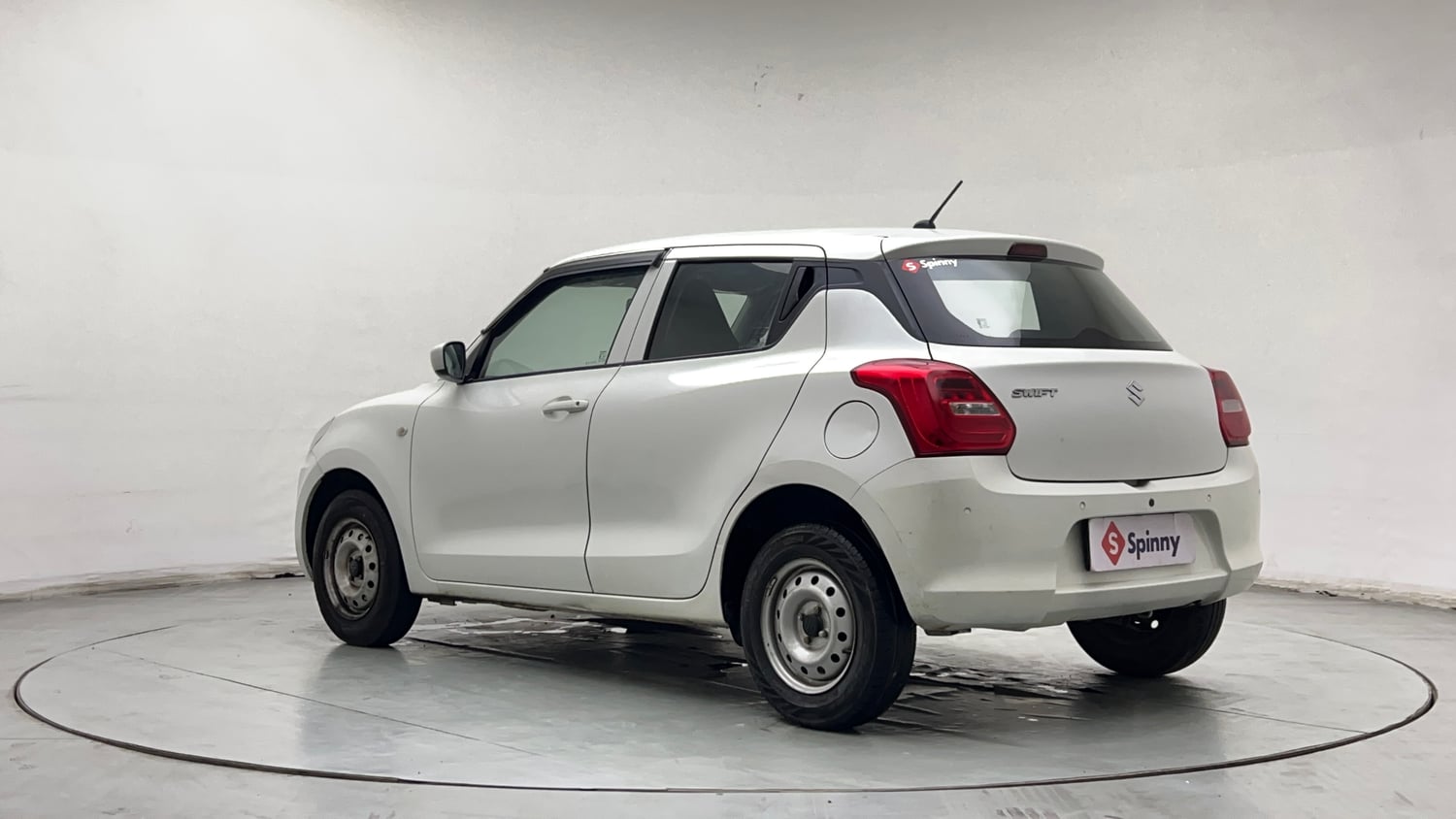 Used 2023 Maruti Suzuki Swift LXi Petrol Manual exterior LEFT REAR CORNER VIEW