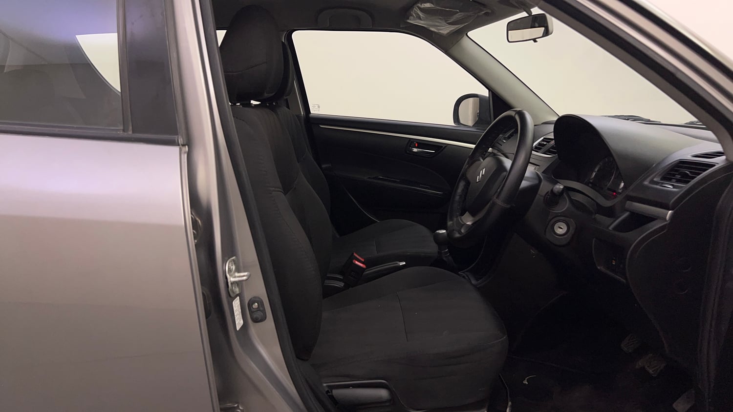 Used 2014 Maruti Suzuki Swift VXi Petrol Manual interior RIGHT SIDE FRONT DOOR CABIN VIEW