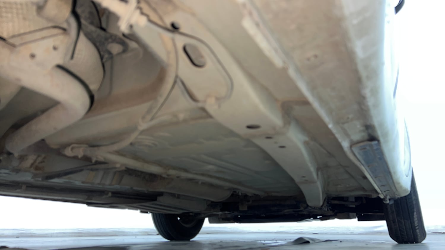 Used 2023 Maruti Suzuki Swift LXi Petrol Manual extra REAR RIGHT UNDERBODY VIEW