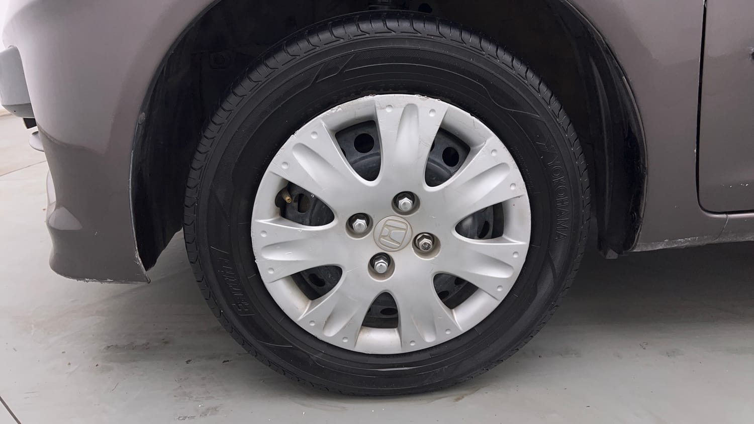 Used 2013 Honda Brio S MT Petrol Manual tyres LEFT FRONT TYRE RIM VIEW