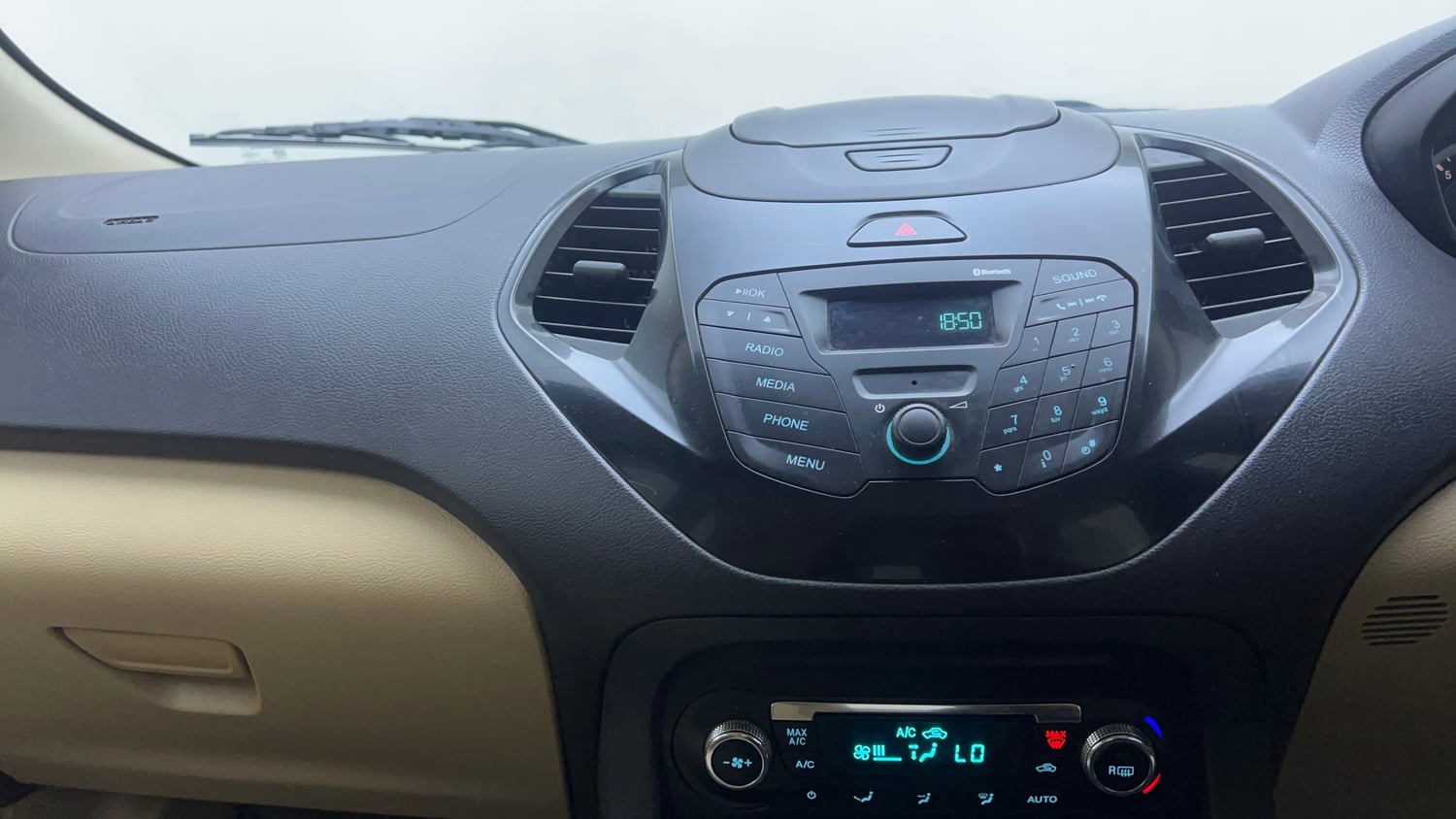 Used 2017 Ford Figo Aspire Titanium 1.2 Ti-VCT Petrol Manual interior MUSIC SYSTEM & AC CONTROL VIEW