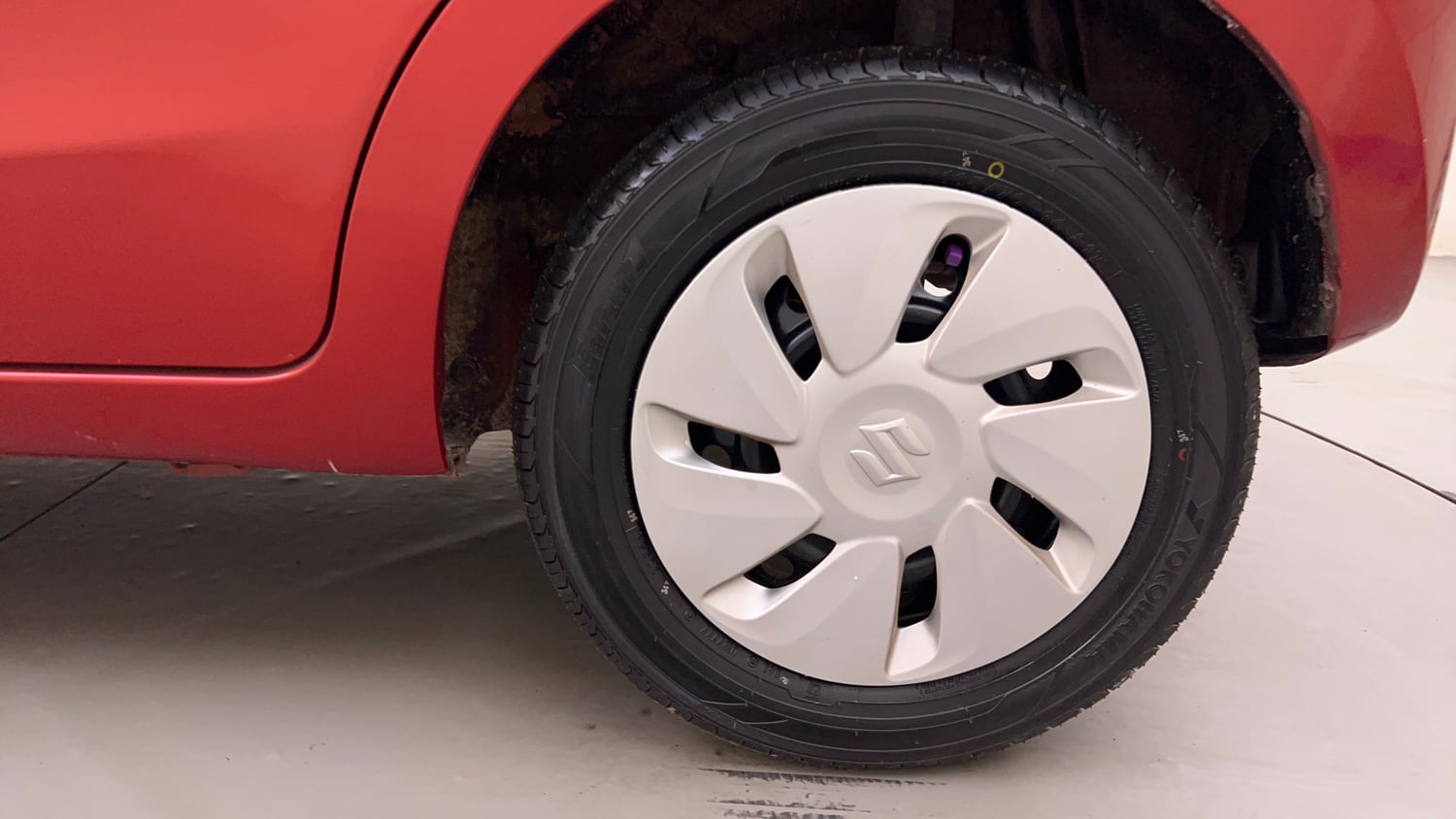 Used 2014 Maruti Suzuki Celerio VXi Petrol Manual tyres LEFT REAR TYRE RIM VIEW