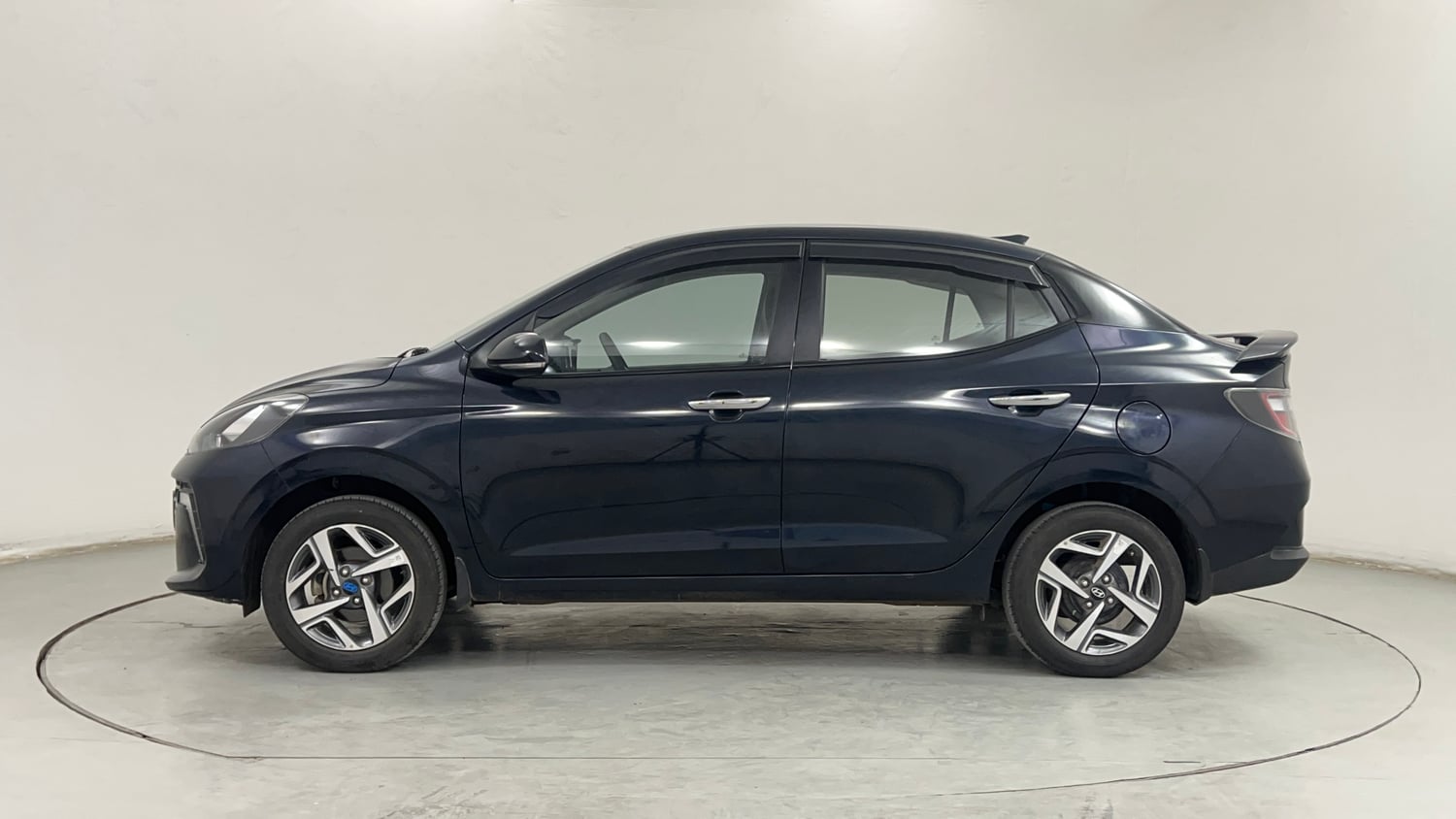 Used 2024 Hyundai Aura SX 1.2 CNG Cng Manual exterior LEFT SIDE VIEW