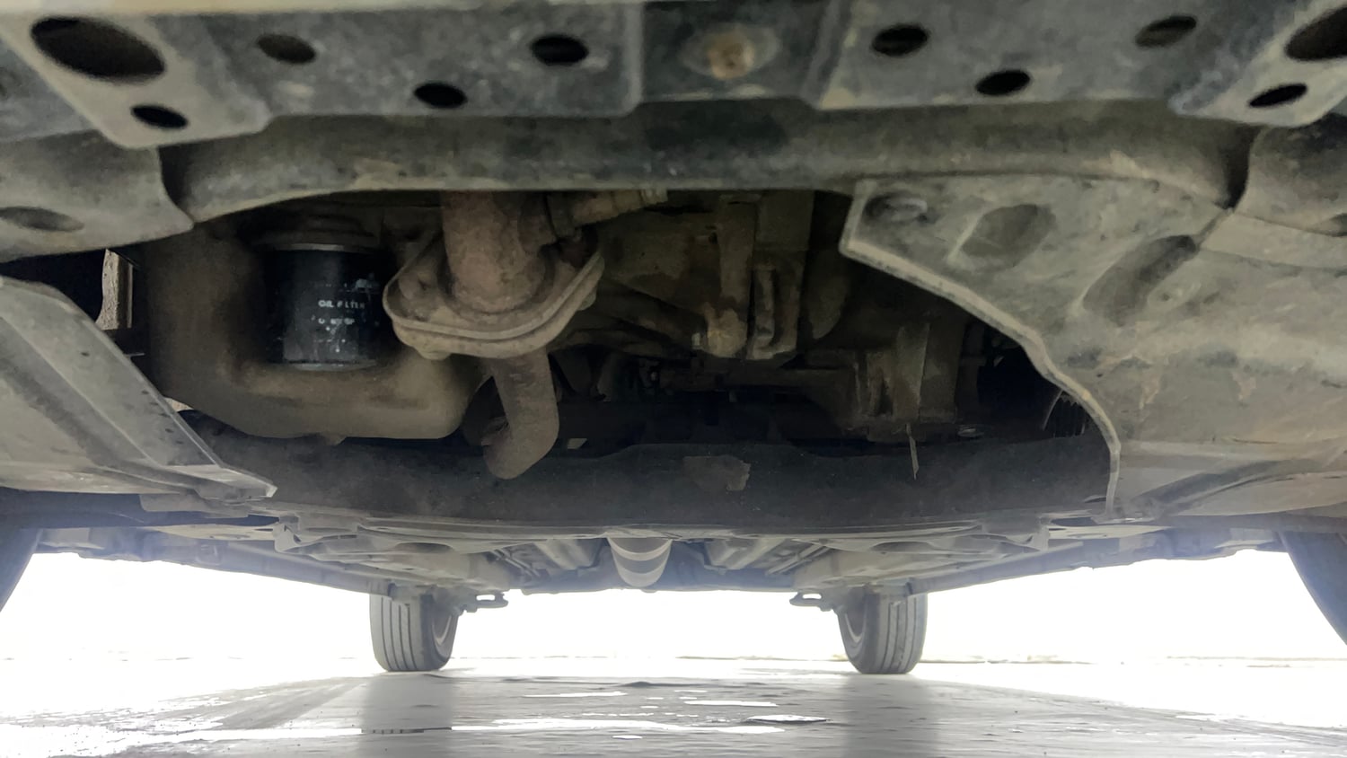 Used 2015 Maruti Suzuki Swift Dzire ZXI Petrol Manual extra FRONT LEFT UNDERBODY VIEW