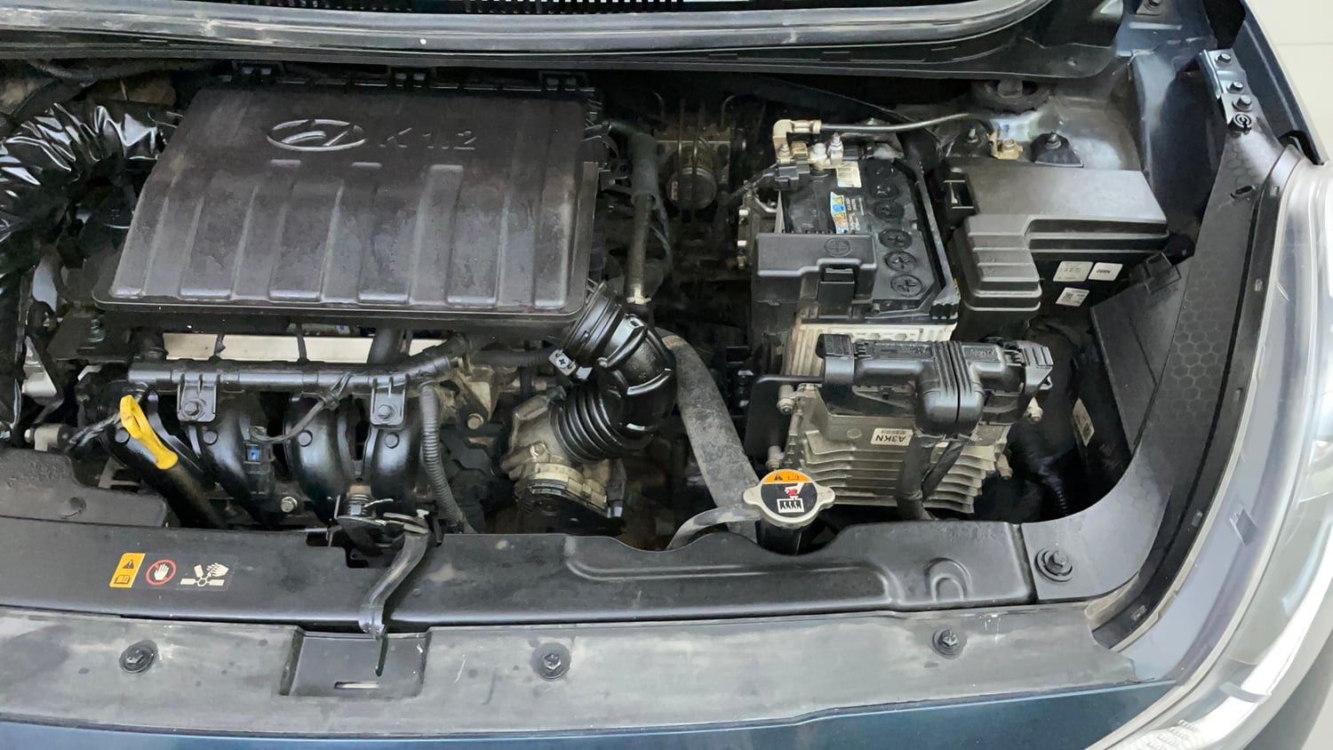 Used 2022 Hyundai Grand i10 Nios Sportz AMT 1.2 Kappa VTVT Petrol Automatic engine ENGINE LEFT SIDE VIEW