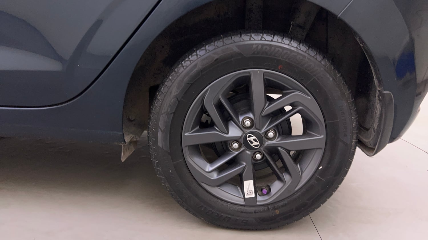 Used 2021 Hyundai Grand i10 Nios Sportz AMT 1.2 CRDi Diesel Automatic tyres LEFT REAR TYRE RIM VIEW
