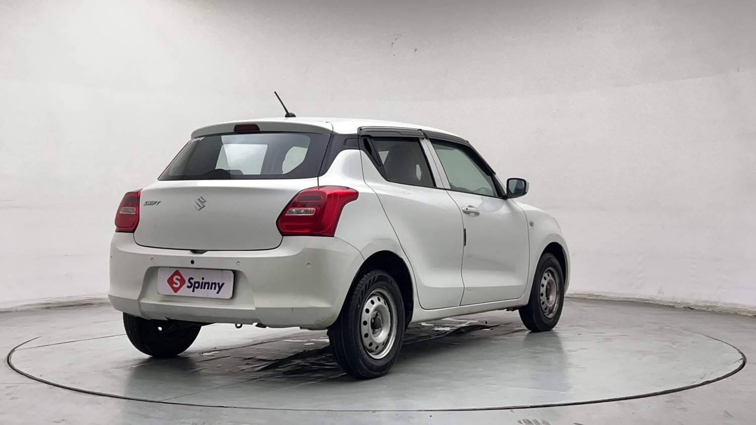 Used 2023 Maruti Suzuki Swift LXi Petrol Manual exterior RIGHT REAR CORNER VIEW