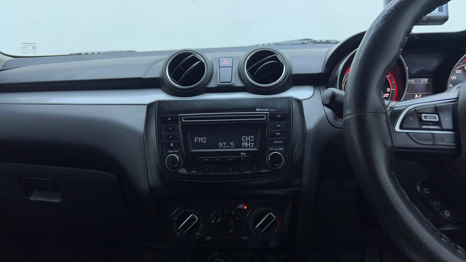 Used 2018 Maruti Suzuki Swift VXi AMT Petrol Automatic top_features Integrated (in-dash) music system