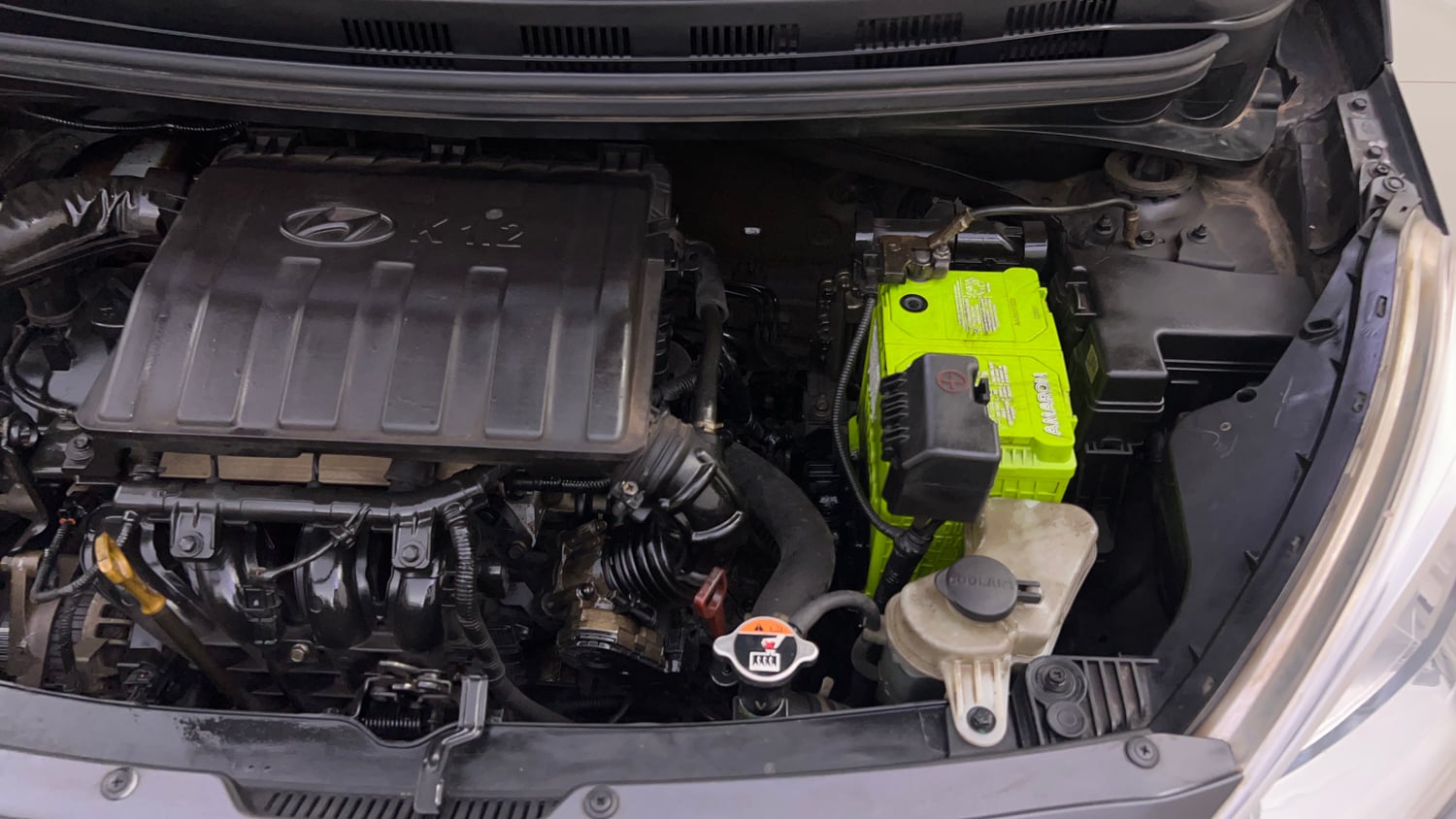 Used 2017 Hyundai Grand i10 Sportz (O) AT 1.2 Kappa VTVT Petrol Automatic engine ENGINE LEFT SIDE VIEW
