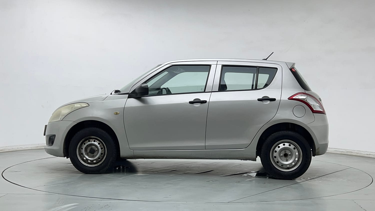 Used 2013 Maruti Suzuki Swift LXi Petrol Manual exterior LEFT SIDE VIEW