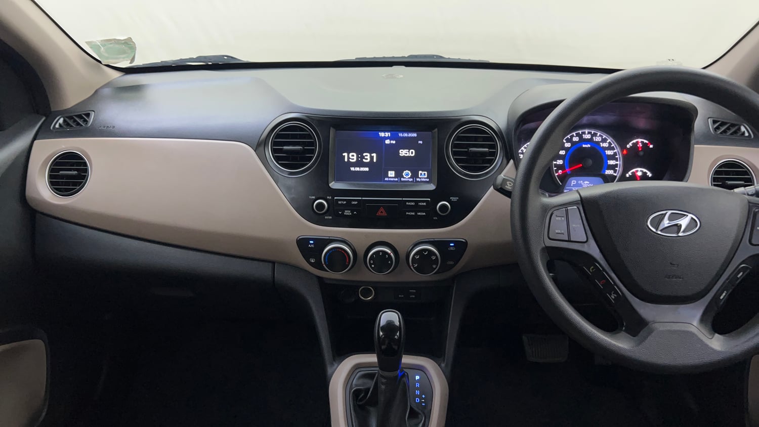 Used 2018 Hyundai Grand i10 Sportz AT 1.2 Kappa VTVT Petrol Automatic interior MUSIC SYSTEM & AC CONTROL VIEW