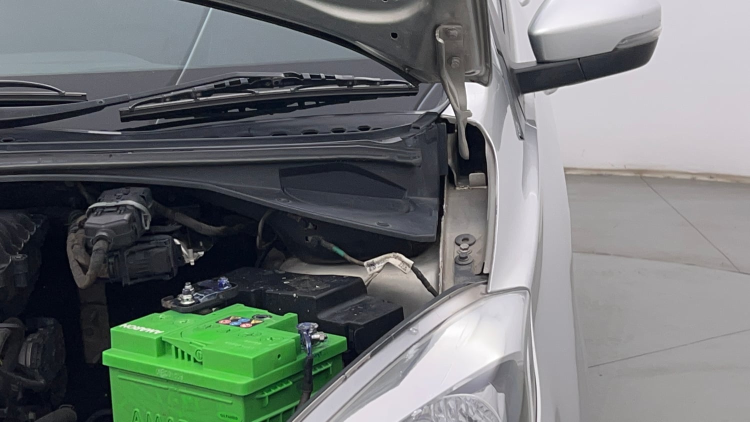 Used 2019 Tata Tiago Revotron XZ w/o Alloy Petrol Manual engine ENGINE LEFT SIDE HINGE & APRON VIEW