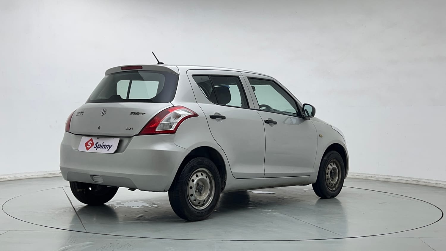 Used 2013 Maruti Suzuki Swift LXi Petrol Manual exterior RIGHT REAR CORNER VIEW
