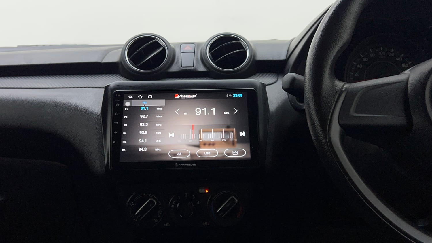Used 2023 Maruti Suzuki Swift LXi Petrol Manual interior MUSIC SYSTEM & AC CONTROL VIEW
