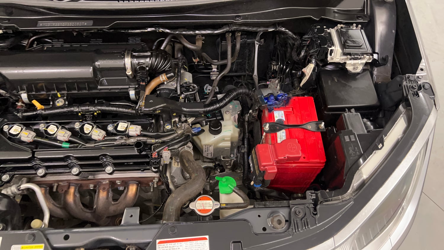 Used 2021 Maruti Suzuki Ignis Zeta 1.2 AMT Petrol Automatic engine ENGINE LEFT SIDE VIEW
