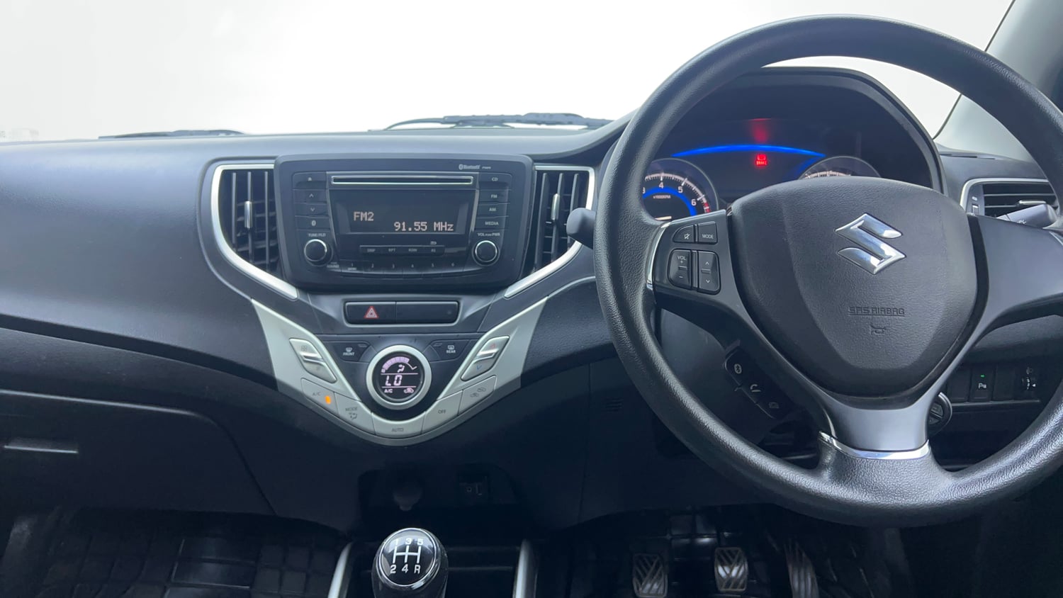 Used 2016 Maruti Suzuki Baleno Delta 1.2 Petrol Manual interior MUSIC SYSTEM & AC CONTROL VIEW